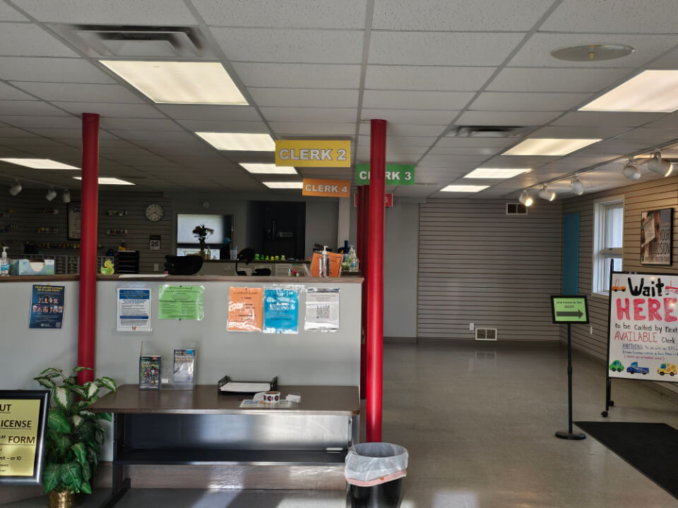 inside office clerks DMV office interior with clerk stations and waiting area